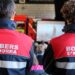 Dos agents del cos de bombers (Foto: Arxiu ANA).