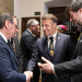El president del grup parlamentari demòcrata, Jordi Jordana, se saluda amb el copríncep francès, Emmanuel Macron.